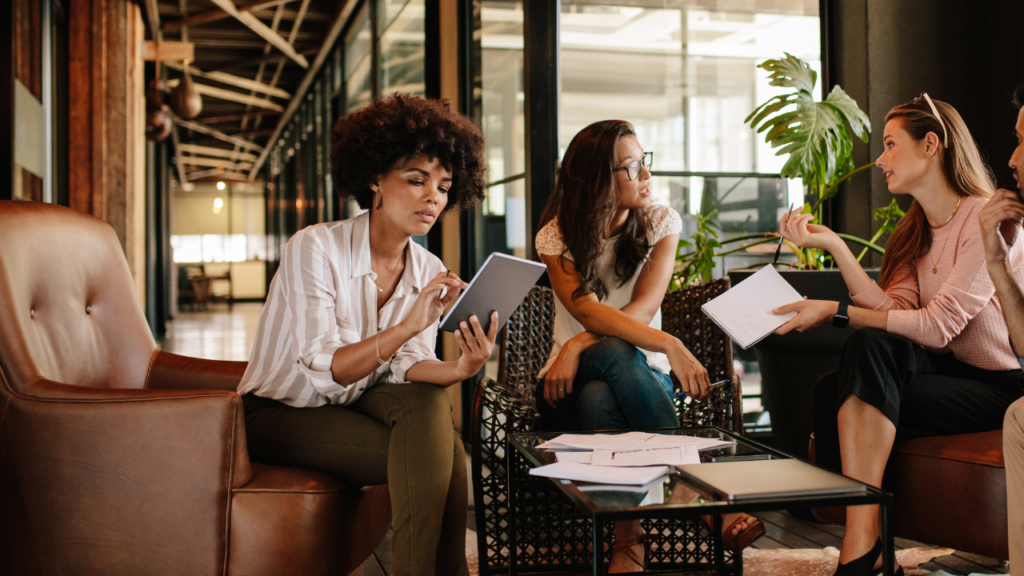 Should You Build a Transaction Coordinator Team? Ask This First 1 Transaction coordinator reviewing team workflow and file assignments on a tablet